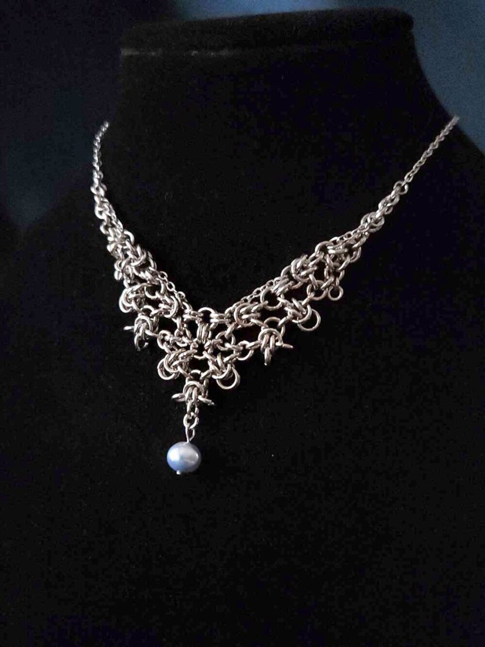 Vintage silver princess necklace with a blue pearl